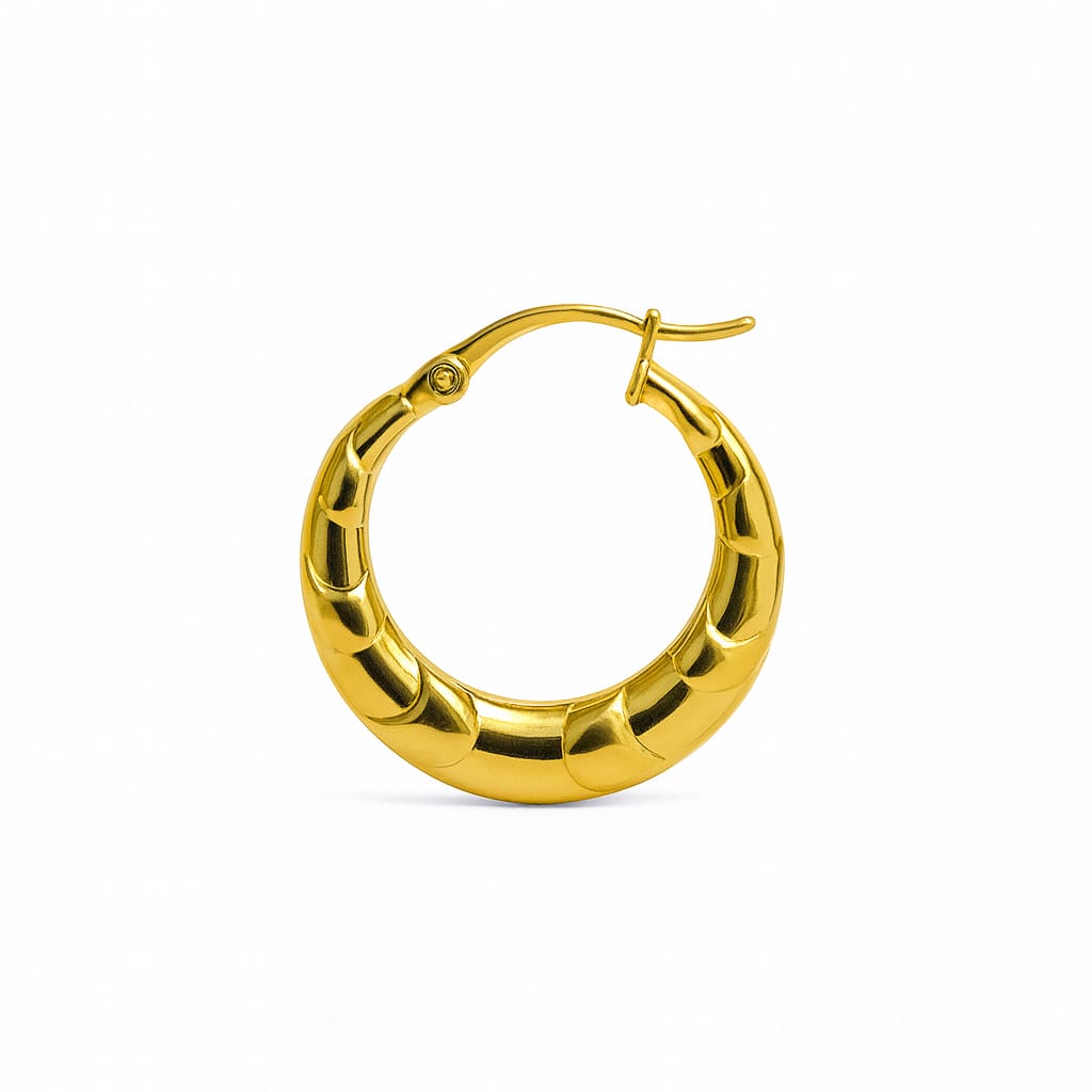 Gold tone stainless bamboo style hoop earring with segmented design and hinged wire closure on white background
